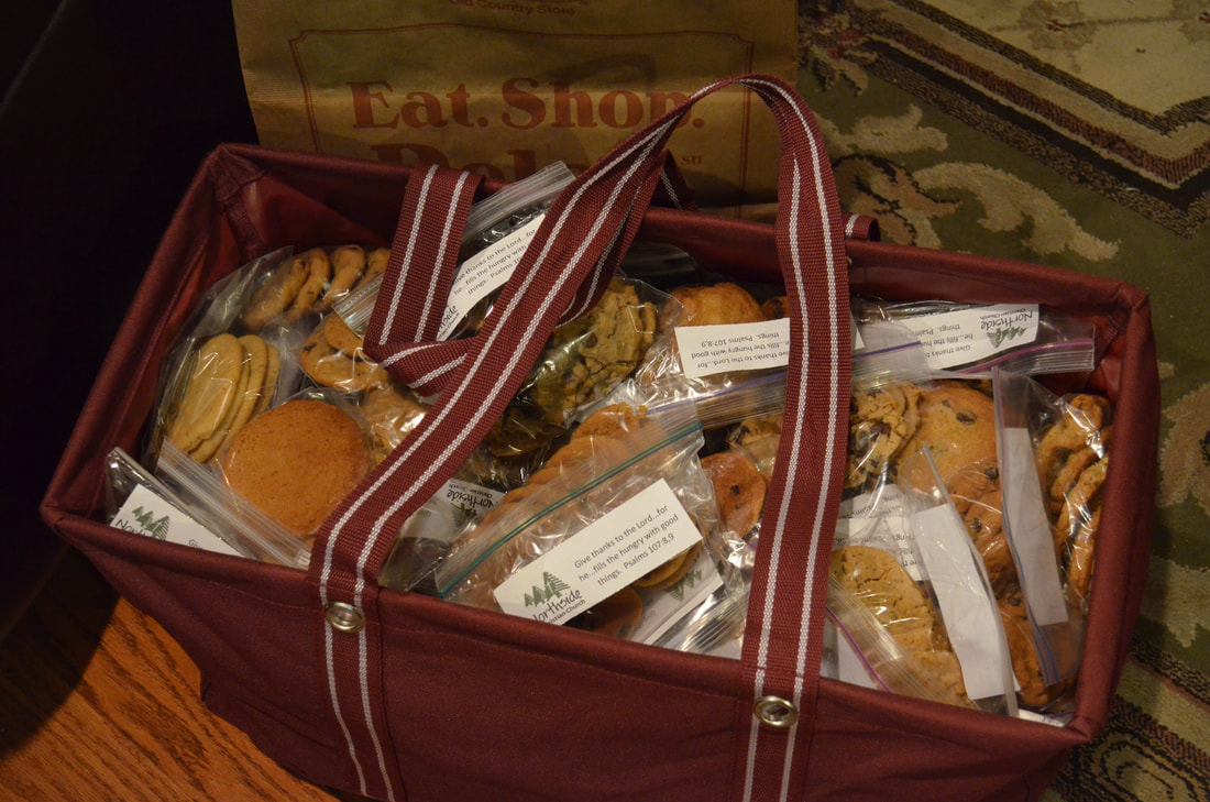 Donating home-made cookies to students forms an alliance between local colleges and NCC.